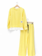 Tuta da donna: felpa con cappuccio e pantaloni della tuta, abbigliamento casual, semplice stile a gamba dritta.