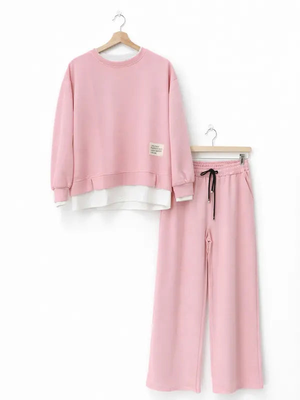 Tuta da donna: felpa con cappuccio e pantaloni della tuta, abbigliamento casual, semplice stile a gamba dritta.