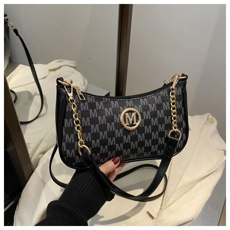 Borsa a mezzaluna di tendenza per donna