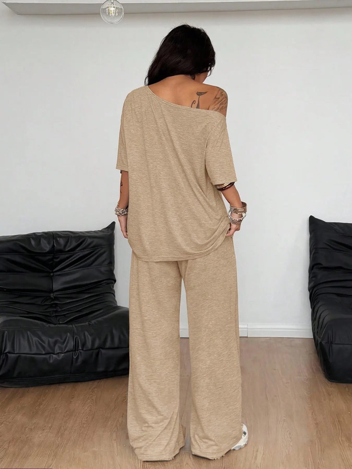 Ensemble deux pièces décontracté de sport de couleur unie pour femme, pantalon long ample et costume à col oblique à jambes larges, mode printemps et automne.