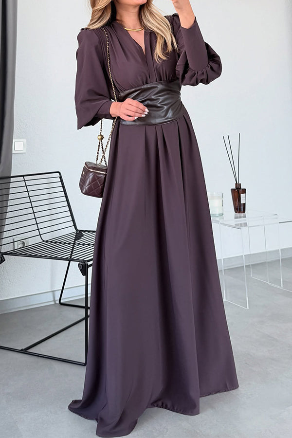 Abito lungo elegante da donna con scollo a V profondo e maniche a lanterna in pelle in vita