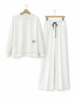 Tuta da donna: felpa con cappuccio e pantaloni della tuta, abbigliamento casual, semplice stile a gamba dritta.