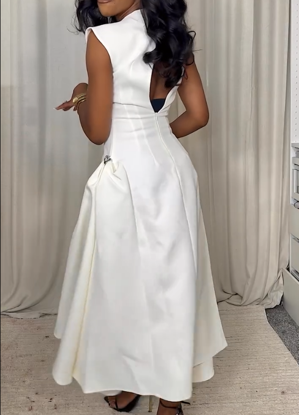 Robe élégante et sobre à col rond de couleur unie pour femme