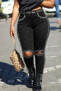 Jean skinny déchiré orné de strass pour femme