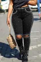 Jean skinny déchiré orné de strass pour femme