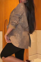 Veste habillée formelle pour femme, coupe cintrée et col teinté, pour un style élégant au quotidien.