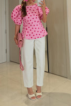 Haut péplum moulant rose décontracté pour femme à manches courtes bouffantes et pois contrastants