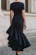 Robe Mi-Longue Femme Noire Col Rond Manches Courtes Taille Fracassée Volants Irréguliers Fendue Sirène
