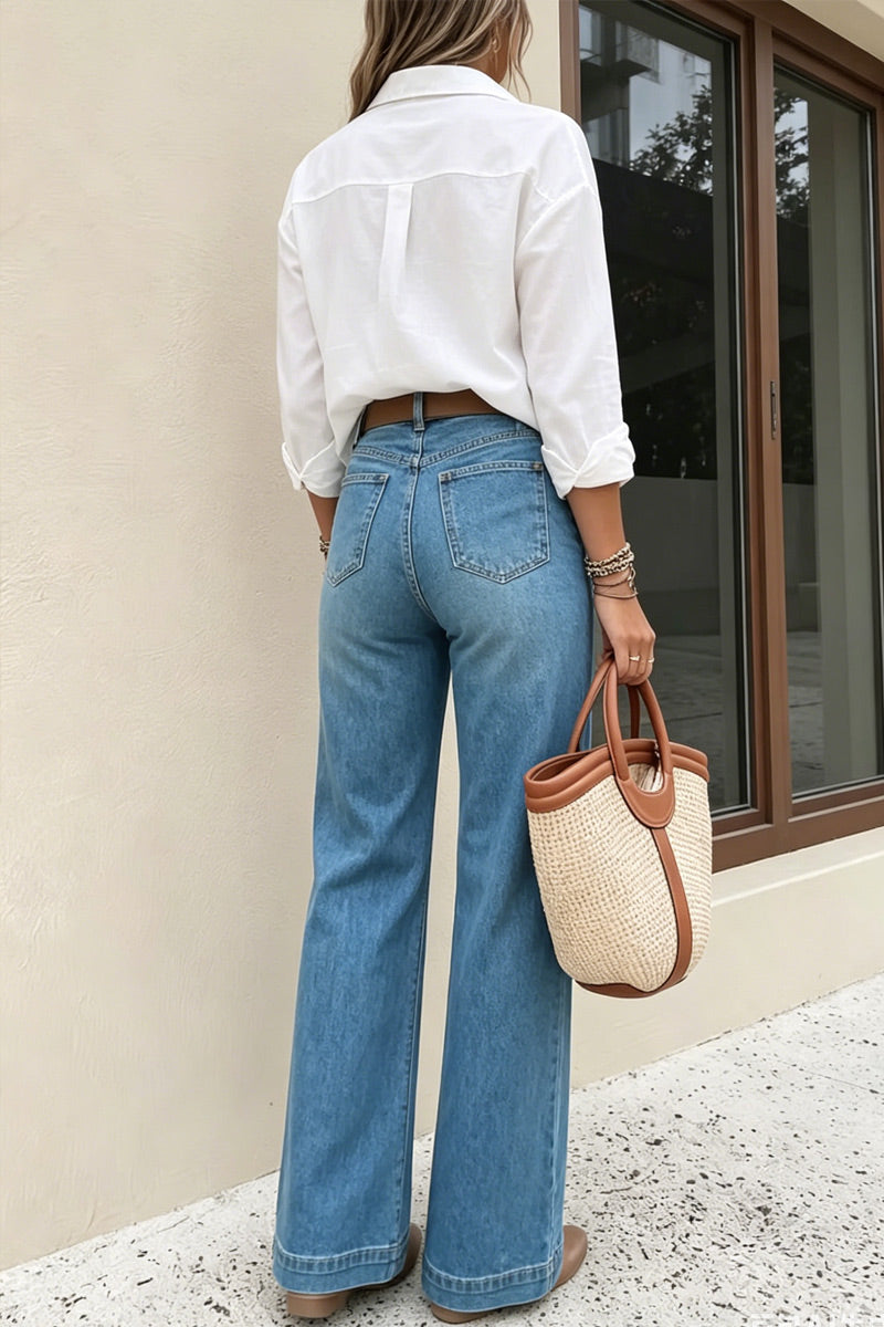 Jean en denim pour femme, bleu clair délavé, taille haute, boutons blancs latéraux, jambes larges