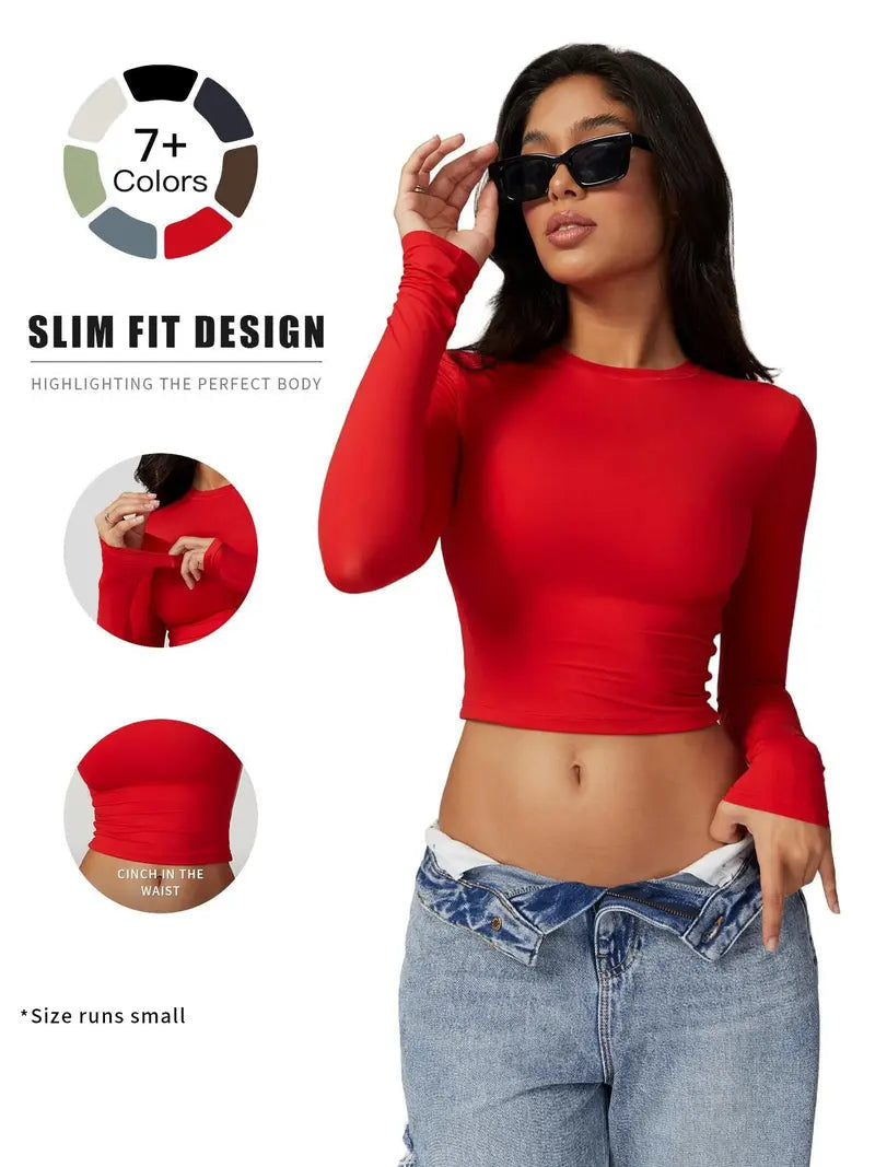 T-shirt sportiva da donna a girocollo tinta unita a compressione