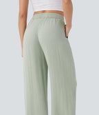 Pantalon ample taille haute en lin avec cordon de serrage et grandes poches