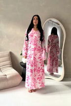 Women's elegant backless floral-lined summer dress with tie-up details