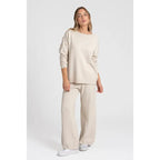 Completo due pezzi in maglia: T-shirt a maniche lunghe, girocollo, pantaloni con elastico in vita, maglia di medio spessore, comodo e versatile, abbigliamento femminile, adatto all'uso quotidiano, specialmente per i cambi di stagione.
