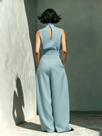 Completo due pezzi da donna con top a collo alto senza maniche e pantaloni lunghi, elegante set a vita alta con pantaloni a palazzo, alla moda per signore