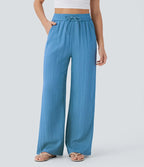 Pantalon ample taille haute en lin avec cordon de serrage et grandes poches