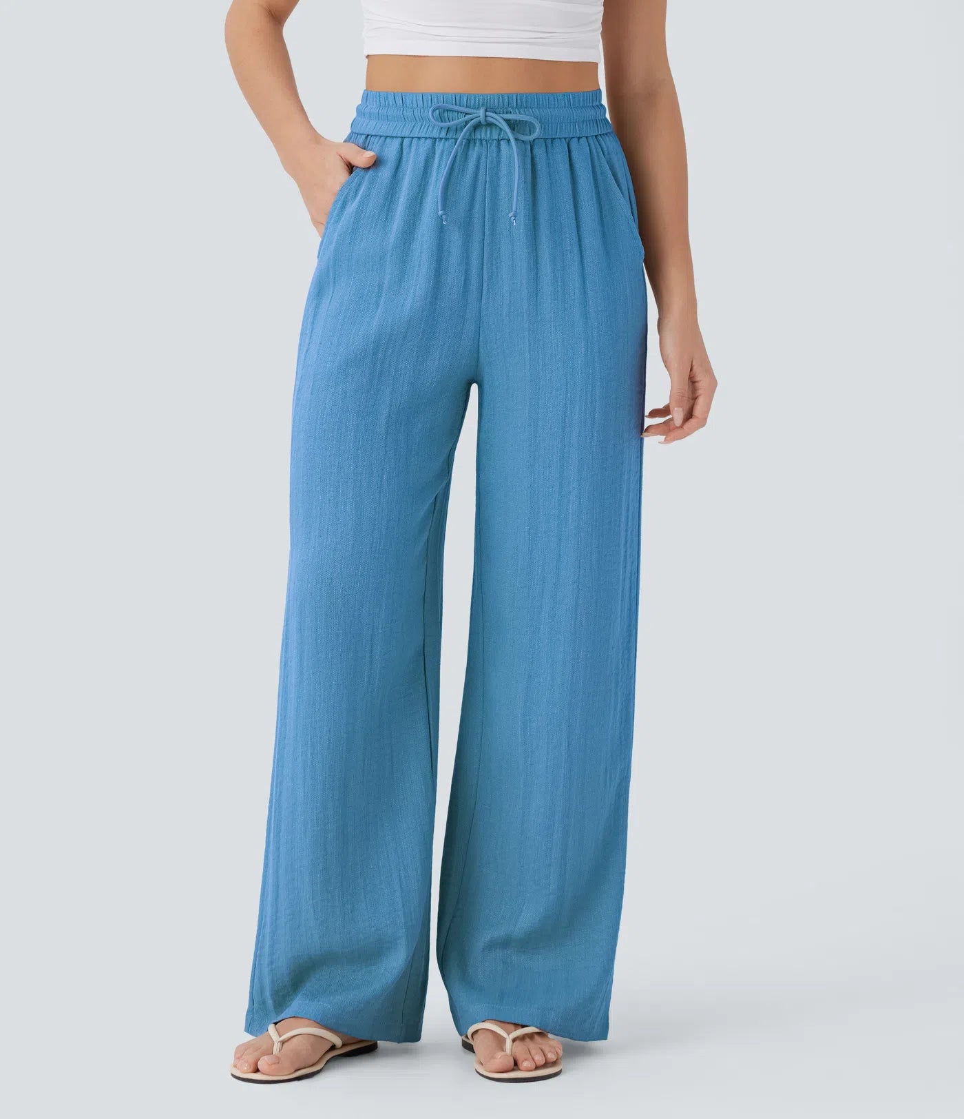 Pantalon ample taille haute en lin avec cordon de serrage et grandes poches