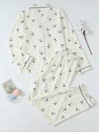 Pigiama da donna a maniche lunghe a righe con stampa a fiocco, grazioso set con parte superiore abbottonata e pantaloni, abbigliamento casual per la casa per tutte le stagioni