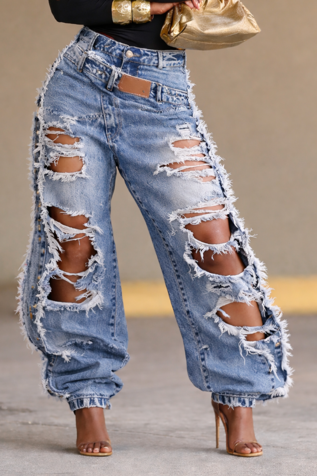 Jeans amples déchirés à franges pour femme