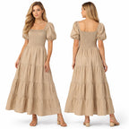 Longue robe smockée pour femme, manches bouffantes, coupe fluide à volants, style élégant pour l'été.