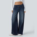 Jeans casual asimmetrici a vita bassa con tasche con cerniera, taglio ampio e slavato