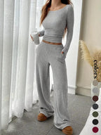 Completo casual da donna a righe con top a maniche lunghe e pantaloni ampi con tasche, abbigliamento femminile in stile europeo, comodo per l'uso quotidiano