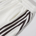 Pantaloni sportivi larghi a gamba larga a righe da donna, casual streetwear, con elastico in vita e tasche laterali per l'allenamento