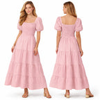 Longue robe smockée pour femme, manches bouffantes, coupe fluide à volants, style élégant pour l'été.