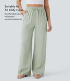 Pantalon ample taille haute en lin avec cordon de serrage et grandes poches