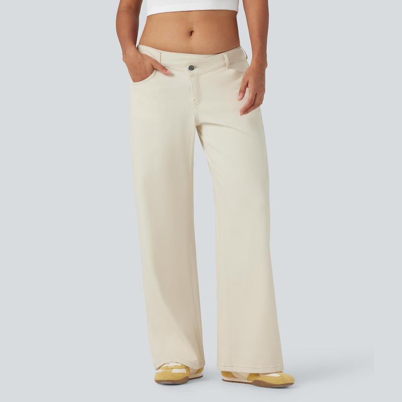 Jeans casual asimmetrici a vita bassa con tasche con cerniera, taglio ampio e slavato