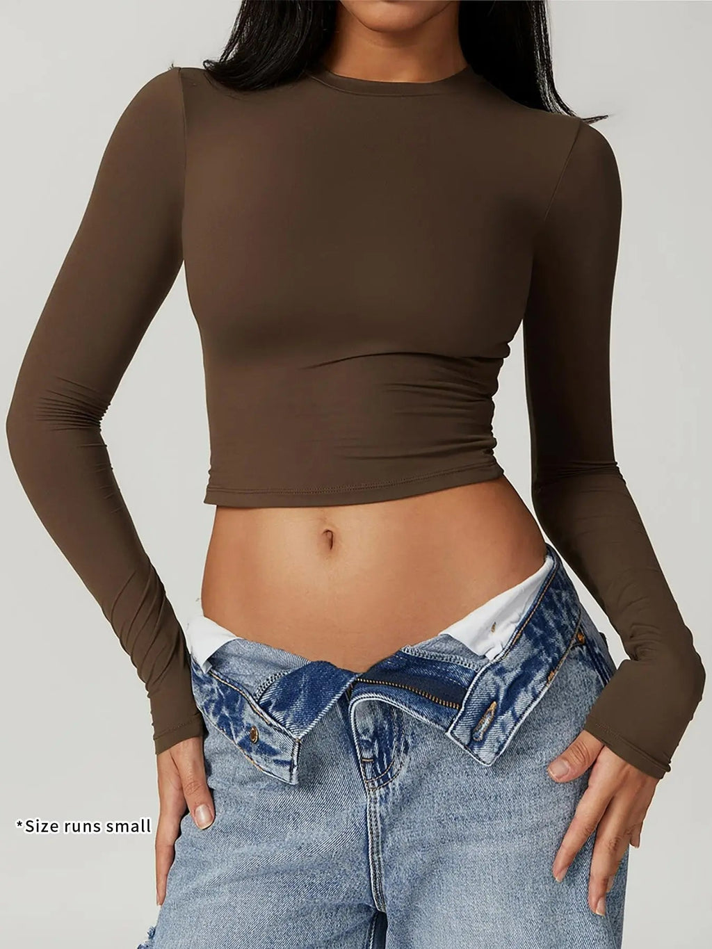 T-shirt sportiva da donna a girocollo tinta unita a compressione