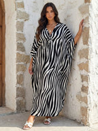 Robe Kaftan fendue à manches chauve-souris et imprimé léopard pour femme, style décontracté et modeste, col en V, manches 3/4, longue robe pour l'automne et l'hiver, vêtements islamiques pour femme pour usage quotidien