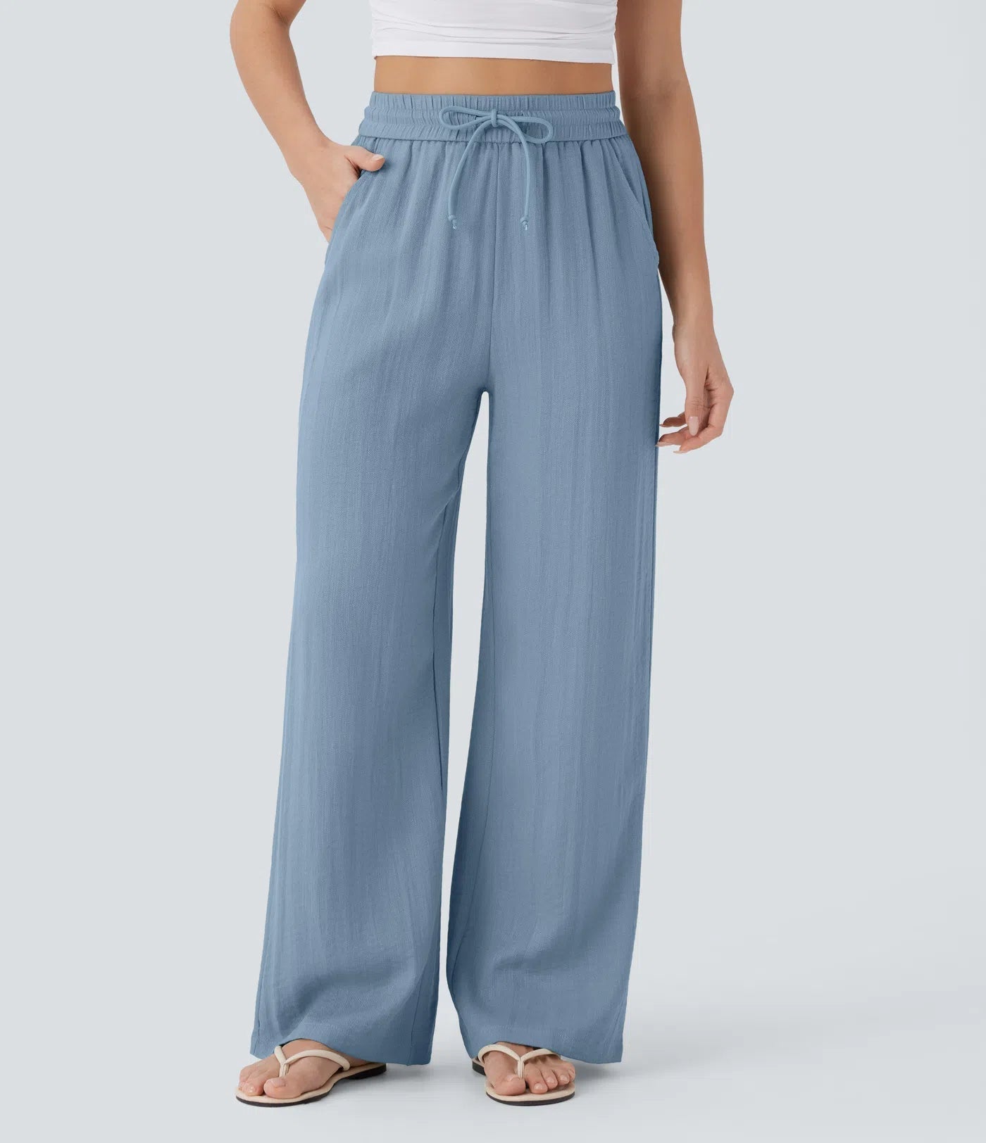 Pantalon ample taille haute en lin avec cordon de serrage et grandes poches