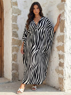 Robe Kaftan fendue à manches chauve-souris et imprimé léopard pour femme, style décontracté et modeste, col en V, manches 3/4, longue robe pour l'automne et l'hiver, vêtements islamiques pour femme pour usage quotidien