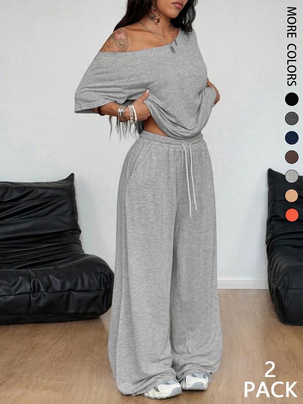 Ensemble deux pièces décontracté de sport de couleur unie pour femme, pantalon long ample et costume à col oblique à jambes larges, mode printemps et automne.