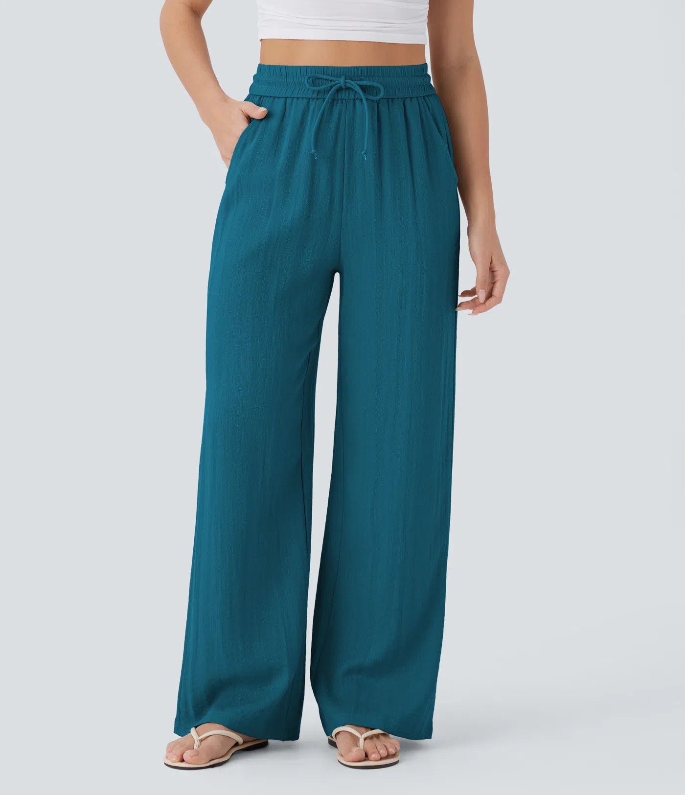 Pantalon ample taille haute en lin avec cordon de serrage et grandes poches