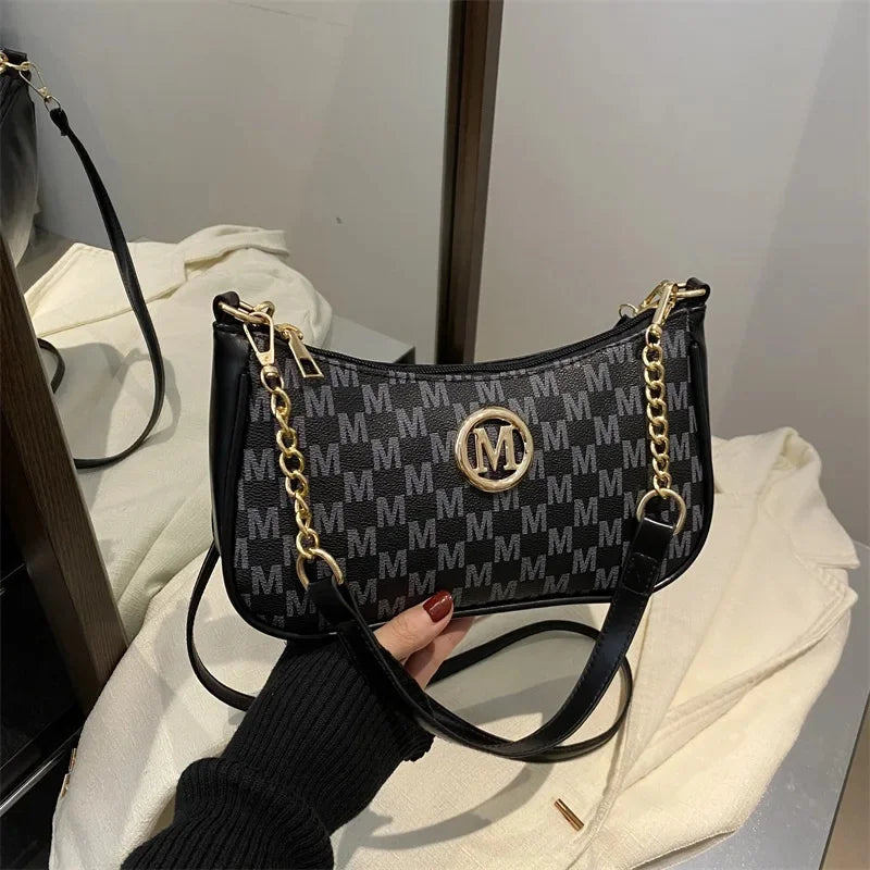 Borsa a mezzaluna di tendenza per donna