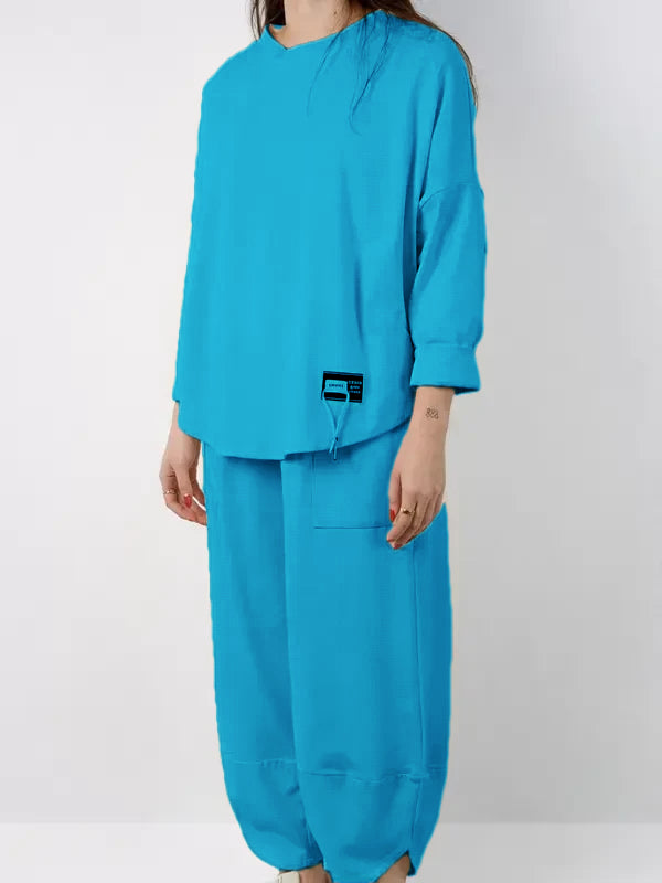Completo due pezzi PRIMAVERA composto da camicia e pantaloni in tessuto morbido e compatto