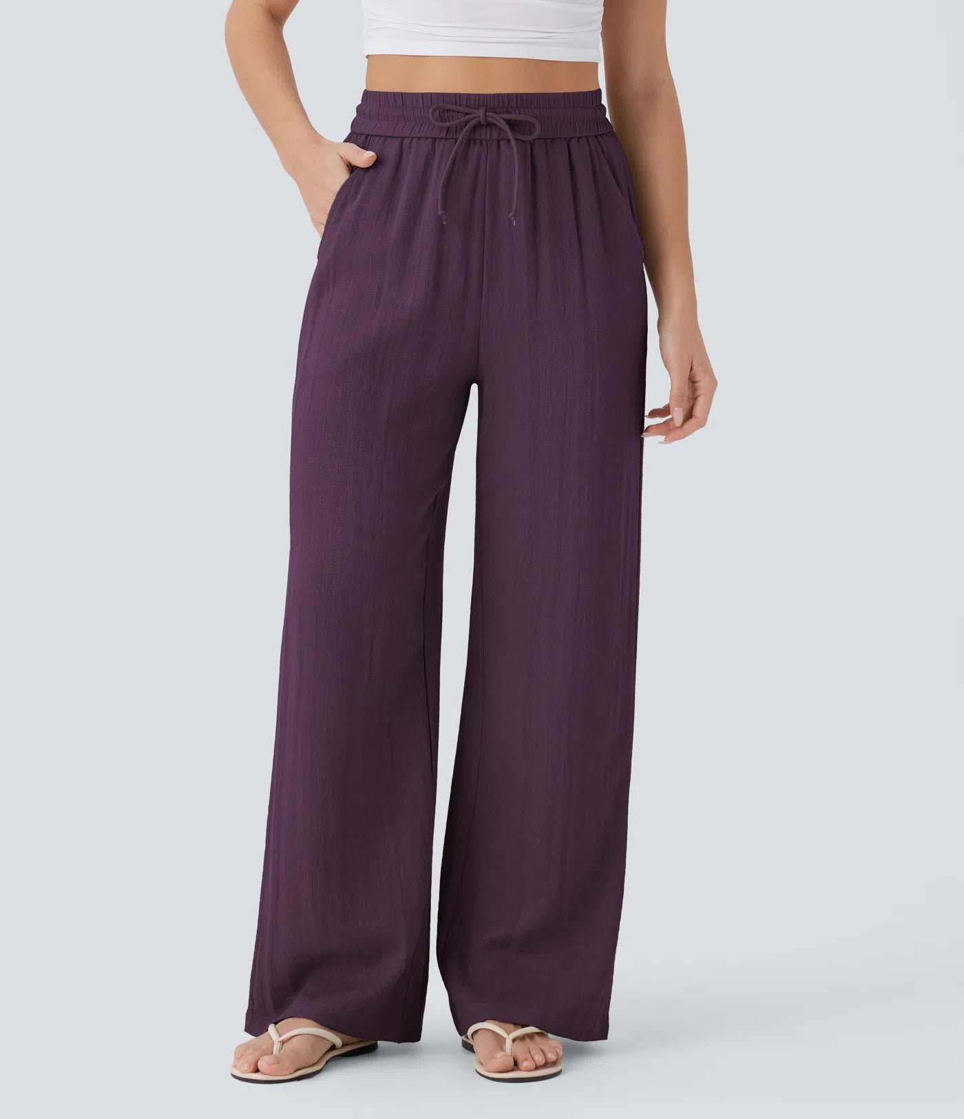 Pantalon ample taille haute en lin avec cordon de serrage et grandes poches