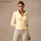 Giacca sportiva da donna con zip intera, maniche lunghe, vestibilità aderente, tessuto elasticizzato ad asciugatura rapida con fori per i pollici per corsa, yoga, palestra, allenamento, abbigliamento sportivo