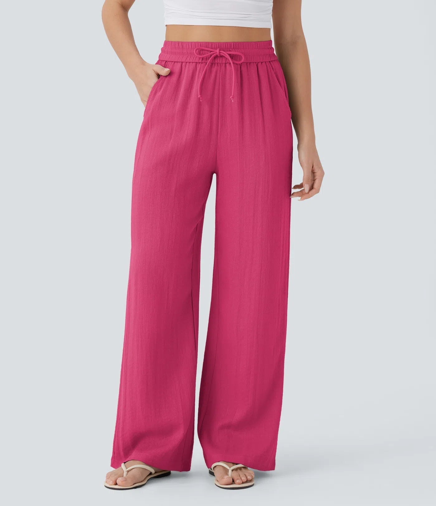 Pantalon ample taille haute en lin avec cordon de serrage et grandes poches