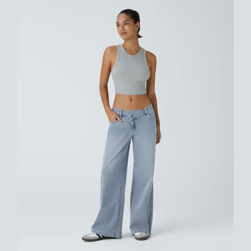 Jeans casual asimmetrici a vita bassa con tasche con cerniera, taglio ampio e slavato