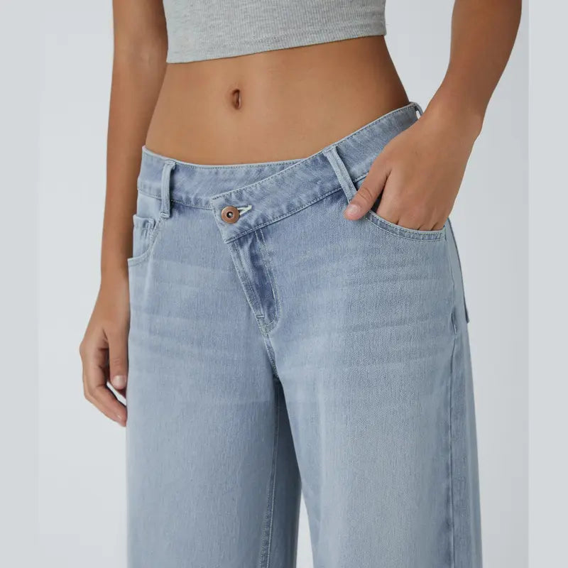 Jeans casual asimmetrici a vita bassa con tasche con cerniera, taglio ampio e slavato