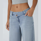 Jeans casual asimmetrici a vita bassa con tasche con cerniera, taglio ampio e slavato