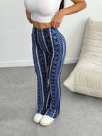 Pantaloni attillati in maglia svasati con stampa geometrica da donna, pantaloni casual estivi comodi ed eleganti per l'uso quotidiano, capi inferiori da donna per tutte le stagioni