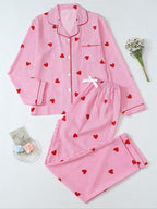 Pigiama da donna a maniche lunghe a righe con stampa a fiocco, grazioso set con parte superiore abbottonata e pantaloni, abbigliamento casual per la casa per tutte le stagioni