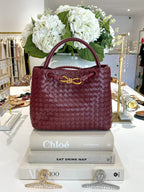 Sac à main de créateur avec détails dorés infinis tissés (11 coloris)