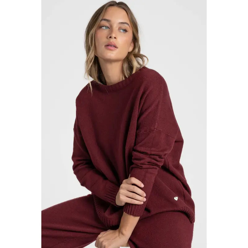 Completo due pezzi in maglia: T-shirt a maniche lunghe, girocollo, pantaloni con elastico in vita, maglia di medio spessore, comodo e versatile, abbigliamento femminile, adatto all'uso quotidiano, specialmente per i cambi di stagione.