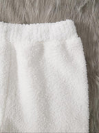 Ensemble deux pièces décontracté pour femme, haut à manches longues de couleur unie et pantalon large élastique, pyjama confortable et minimaliste à col rond