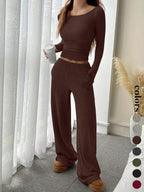 Completo casual da donna a righe con top a maniche lunghe e pantaloni ampi con tasche, abbigliamento femminile in stile europeo, comodo per l'uso quotidiano