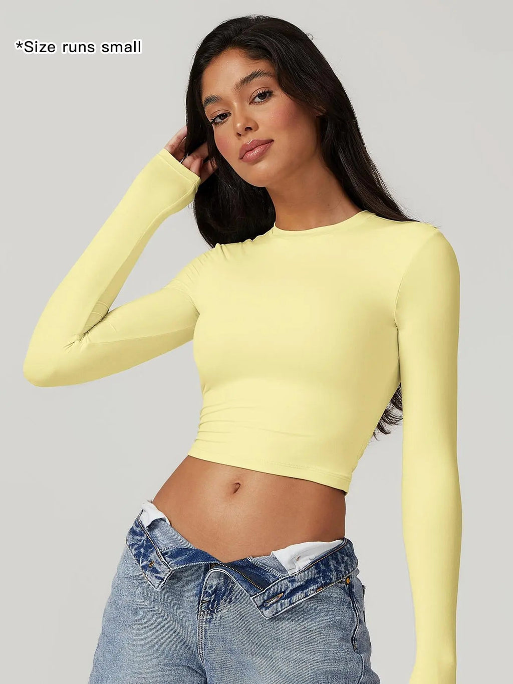 T-shirt sportiva da donna a girocollo tinta unita a compressione